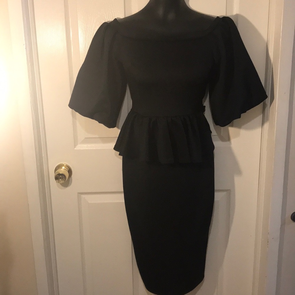 Black peplum midi dress.